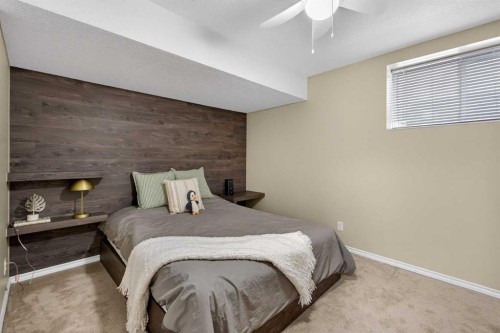 133 Cimarron Drive, Okotoks, AB - Indoor Photo Showing Bedroom