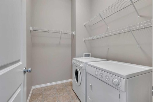 161 Silverado Range Cove Sw, Calgary, AB - Indoor Photo Showing Laundry Room