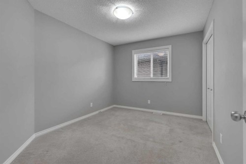 161 Silverado Range Cove Sw, Calgary, AB - Indoor Photo Showing Other Room