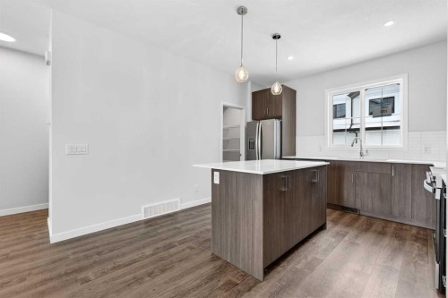 120-1750 Rangeview Drive Se, Calgary, AB - Indoor Photo Showing Kitchen With Upgraded Kitchen