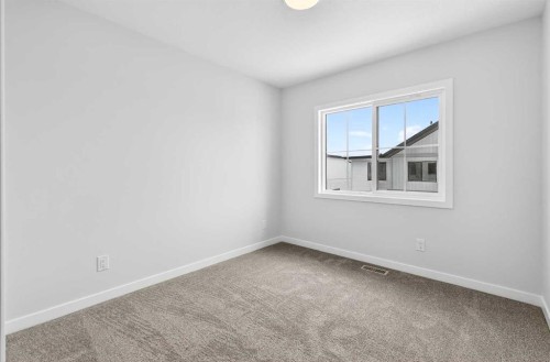 120-1750 Rangeview Drive Se, Calgary, AB - Indoor Photo Showing Other Room