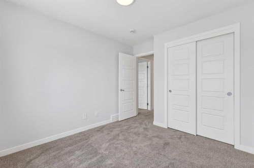 120-1750 Rangeview Drive Se, Calgary, AB - Indoor Photo Showing Other Room