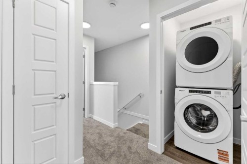 120-1750 Rangeview Drive Se, Calgary, AB - Indoor Photo Showing Laundry Room