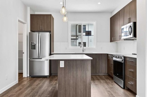 120-1750 Rangeview Drive Se, Calgary, AB - Indoor Photo Showing Kitchen