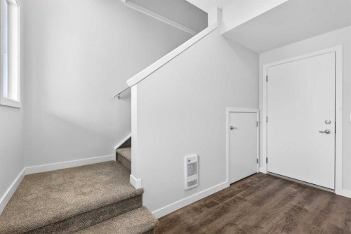 120-1750 Rangeview Drive Se, Calgary, AB - Indoor Photo Showing Other Room