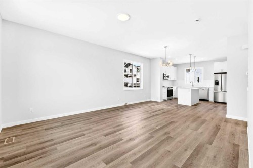 122-1750 Rangeview Drive Se, Calgary, AB - Indoor Photo Showing Other Room