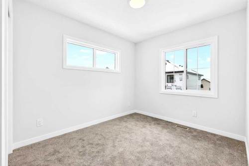 122-1750 Rangeview Drive Se, Calgary, AB - Indoor Photo Showing Other Room