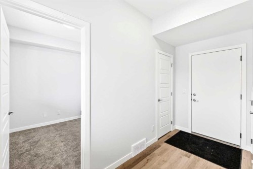 122-1750 Rangeview Drive Se, Calgary, AB - Indoor Photo Showing Other Room