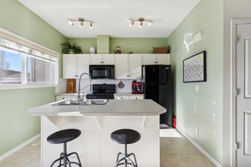 165 Cranford Drive Se, Calgary, AB - Indoor Photo Showing Kitchen With Double Sink