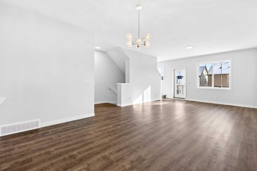 117-1750 Rangeview Drive Se, Calgary, AB - Indoor Photo Showing Other Room