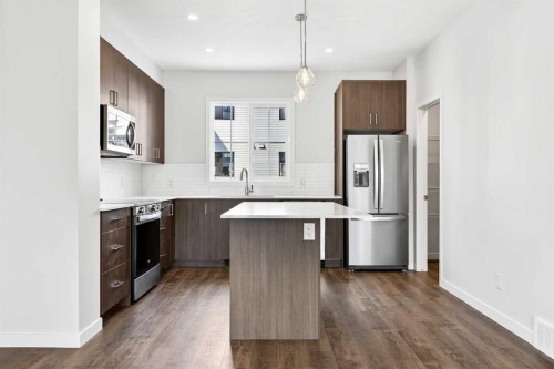 117-1750 Rangeview Drive Se, Calgary, AB - Indoor Photo Showing Kitchen With Upgraded Kitchen