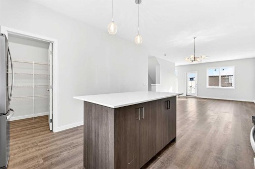 117-1750 Rangeview Drive Se, Calgary, AB - Indoor Photo Showing Kitchen