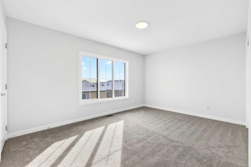 117-1750 Rangeview Drive Se, Calgary, AB - Indoor Photo Showing Other Room