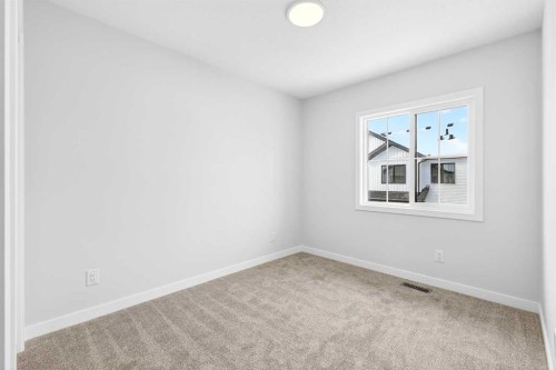 117-1750 Rangeview Drive Se, Calgary, AB - Indoor Photo Showing Other Room