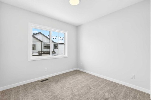 117-1750 Rangeview Drive Se, Calgary, AB - Indoor Photo Showing Other Room