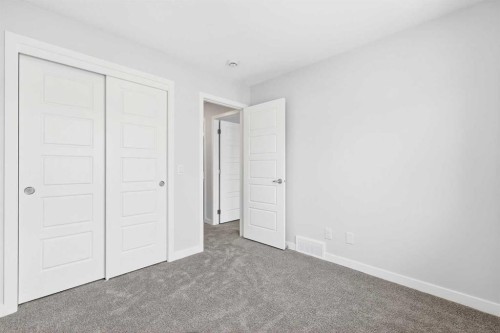 117-1750 Rangeview Drive Se, Calgary, AB - Indoor Photo Showing Other Room