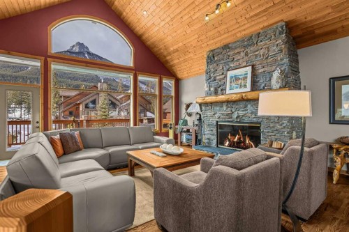 116-210 Hubman Landing, Canmore, AB - Indoor Photo Showing Living Room With Fireplace