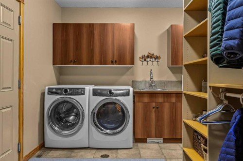 116-210 Hubman Landing, Canmore, AB - Indoor Photo Showing Laundry Room