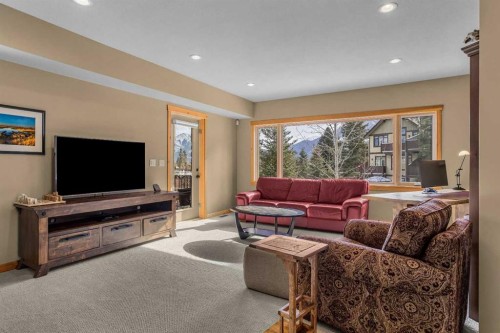 116-210 Hubman Landing, Canmore, AB - Indoor Photo Showing Living Room