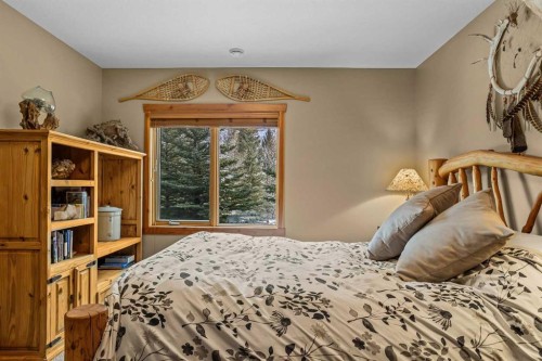 116-210 Hubman Landing, Canmore, AB - Indoor Photo Showing Bedroom