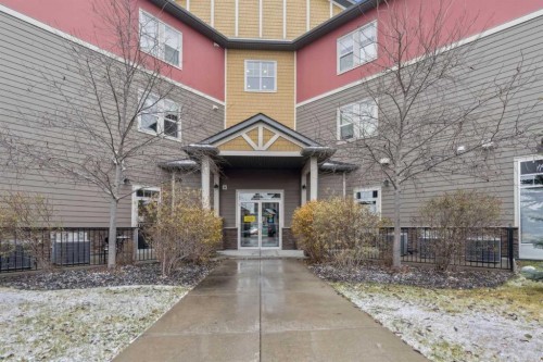 9312-101 Sunset Drive, Cochrane, AB - Outdoor With Deck Patio Veranda With Facade