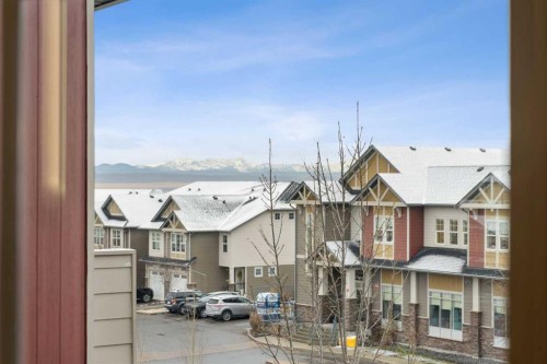 9312-101 Sunset Drive, Cochrane, AB - Outdoor With Facade