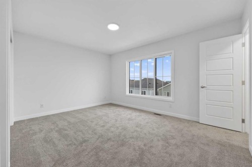 127-1750 Rangeview Drive Se, Calgary, AB - Indoor Photo Showing Other Room