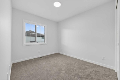127-1750 Rangeview Drive Se, Calgary, AB - Indoor Photo Showing Other Room