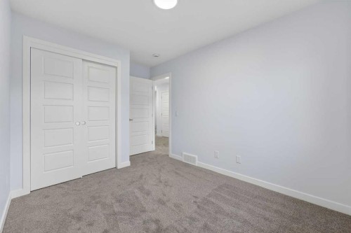 127-1750 Rangeview Drive Se, Calgary, AB - Indoor Photo Showing Other Room