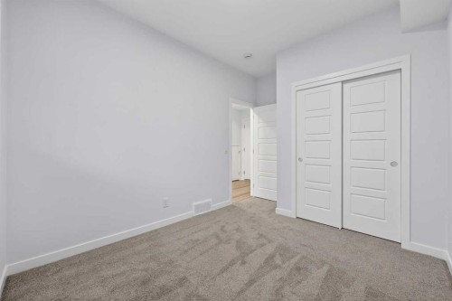 127-1750 Rangeview Drive Se, Calgary, AB - Indoor Photo Showing Other Room