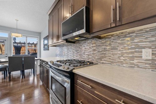 15 Sherwood Square Nw, Calgary, AB - Indoor Photo Showing Kitchen With Upgraded Kitchen