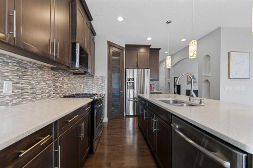 15 Sherwood Square Nw, Calgary, AB - Indoor Photo Showing Kitchen With Stainless Steel Kitchen With Double Sink With Upgraded Kitchen