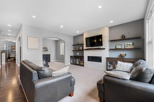 15 Sherwood Square Nw, Calgary, AB - Indoor Photo Showing Living Room With Fireplace