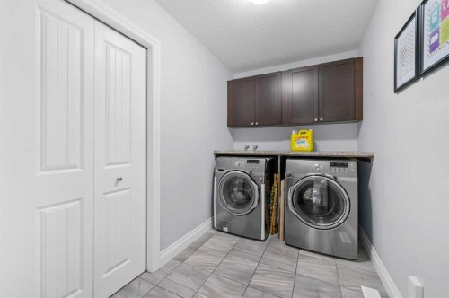 15 Sherwood Square Nw, Calgary, AB - Indoor Photo Showing Laundry Room