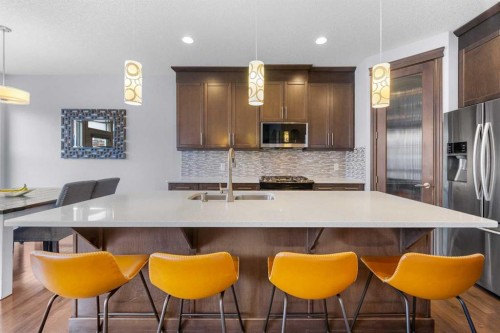 15 Sherwood Square Nw, Calgary, AB - Indoor Photo Showing Kitchen With Stainless Steel Kitchen With Double Sink With Upgraded Kitchen