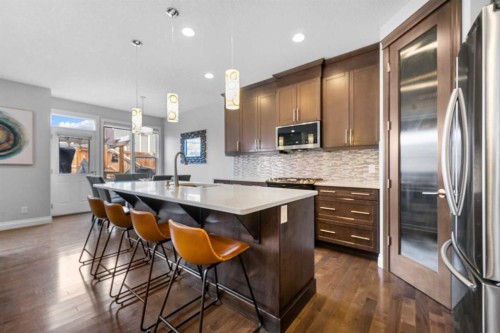 15 Sherwood Square Nw, Calgary, AB - Indoor Photo Showing Kitchen With Stainless Steel Kitchen With Upgraded Kitchen