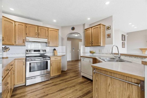 105 Douglas Ridge Circle Se, Calgary, AB - Indoor Photo Showing Kitchen With Double Sink