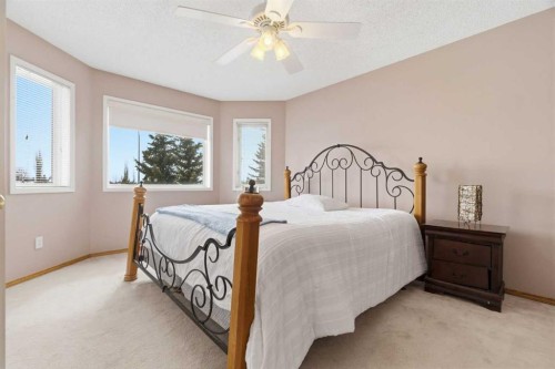 105 Douglas Ridge Circle Se, Calgary, AB - Indoor Photo Showing Bedroom