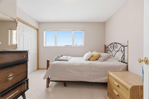 105 Douglas Ridge Circle Se, Calgary, AB - Indoor Photo Showing Bedroom