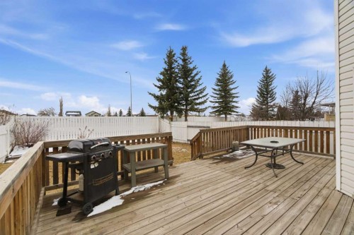 105 Douglas Ridge Circle Se, Calgary, AB - Outdoor With Deck Patio Veranda With Exterior