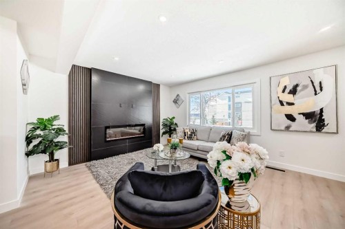 4936 45 Street Sw, Calgary, AB - Indoor Photo Showing Living Room With Fireplace