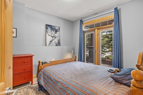 201-70 Dyrgas Gate, Canmore, AB - Indoor Photo Showing Bedroom