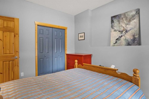 201-70 Dyrgas Gate, Canmore, AB - Indoor Photo Showing Bedroom