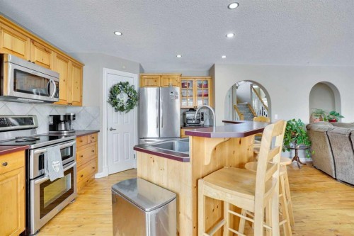 251 Lakeview Cove, Chestermere, AB - Indoor Photo Showing Kitchen With Double Sink