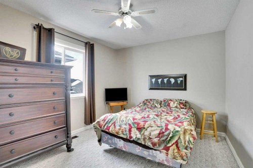251 Lakeview Cove, Chestermere, AB - Indoor Photo Showing Bedroom