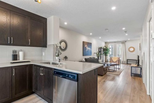 505-338 Seton Circle Se, Calgary, AB - Indoor Photo Showing Kitchen With Double Sink With Upgraded Kitchen