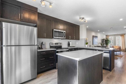 505-338 Seton Circle Se, Calgary, AB - Indoor Photo Showing Kitchen With Upgraded Kitchen