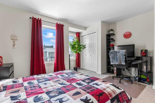 505-338 Seton Circle Se, Calgary, AB - Indoor Photo Showing Bedroom
