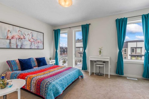 505-338 Seton Circle Se, Calgary, AB - Indoor Photo Showing Bedroom