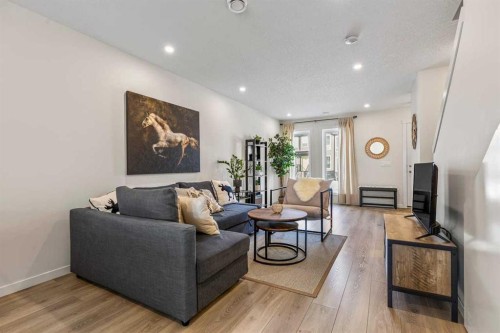505-338 Seton Circle Se, Calgary, AB - Indoor Photo Showing Living Room
